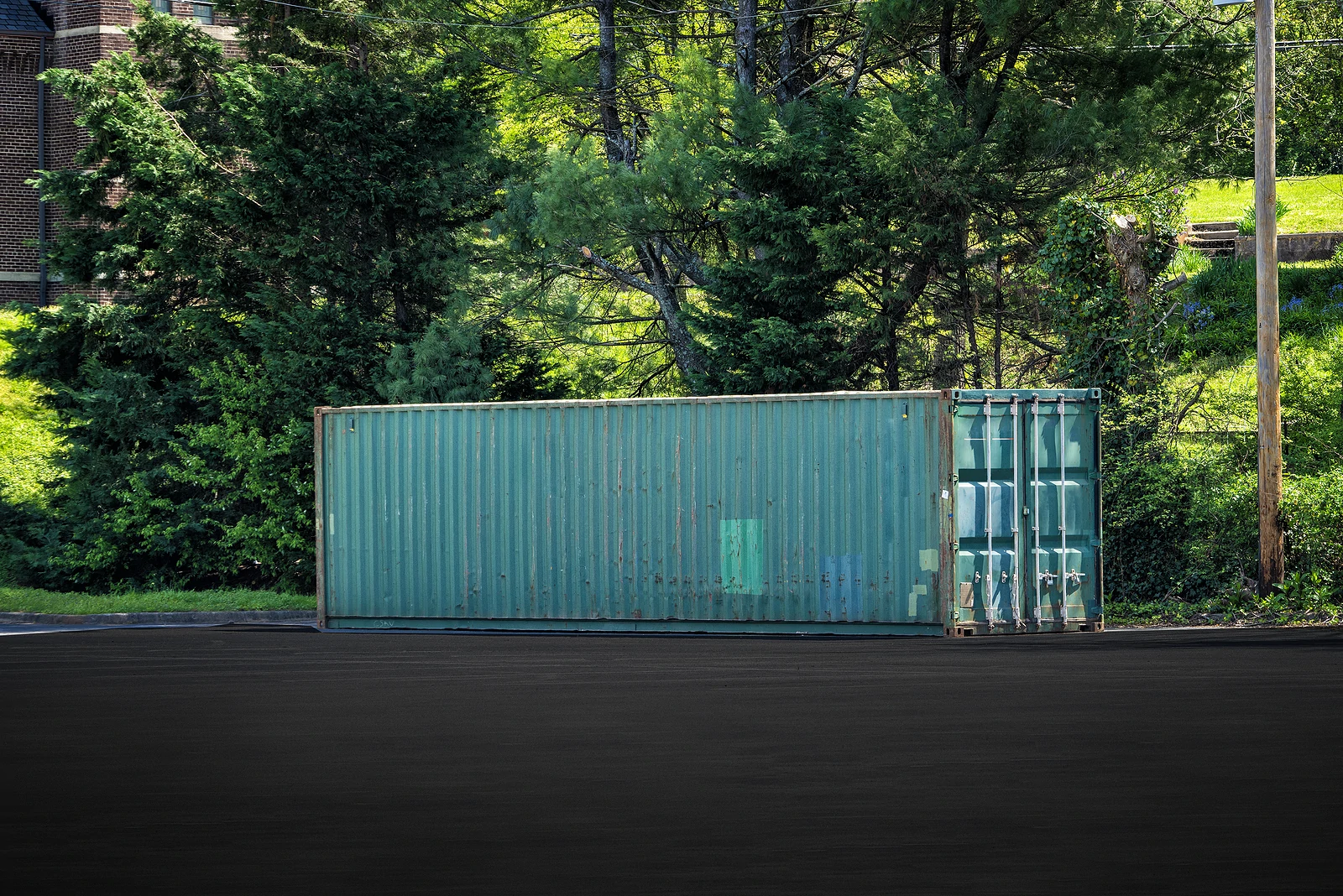 Portable storage and shipping container